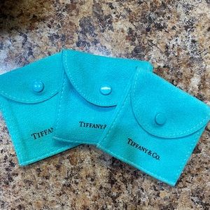 Tiffany & Co snap pouch trio